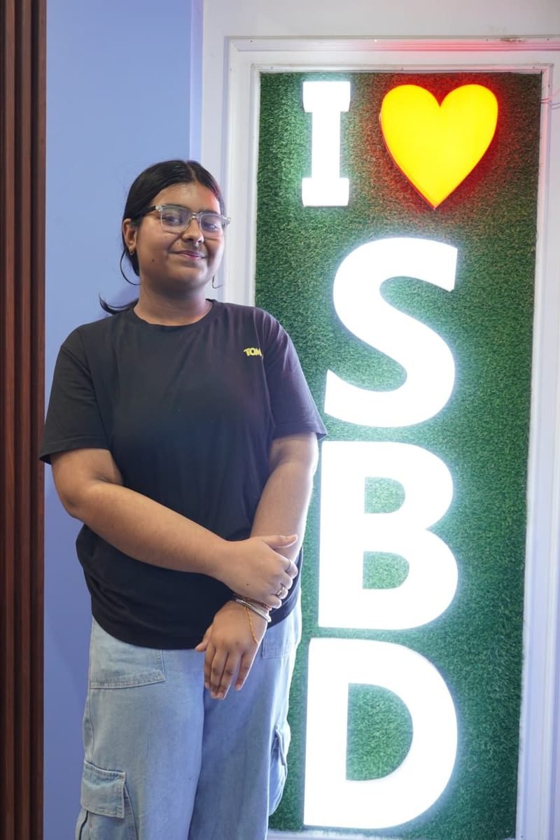 Student at the I love SBD wall