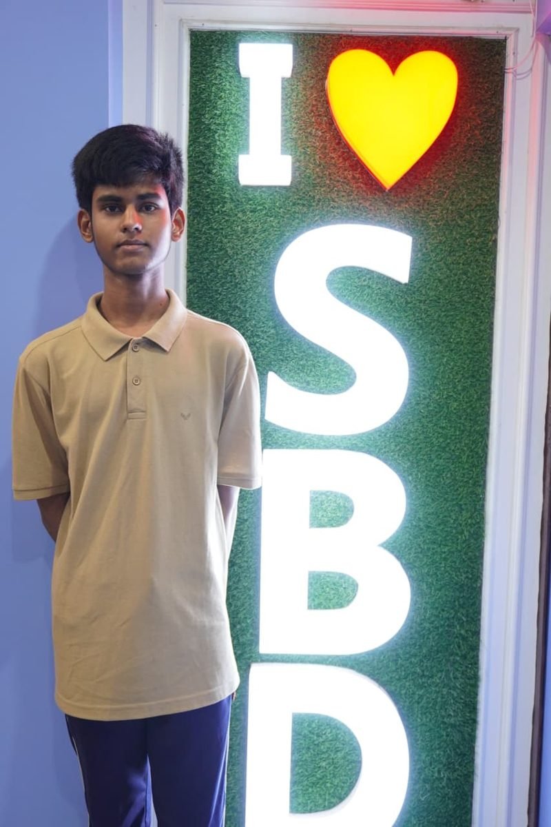 Student at the I love SBD wall