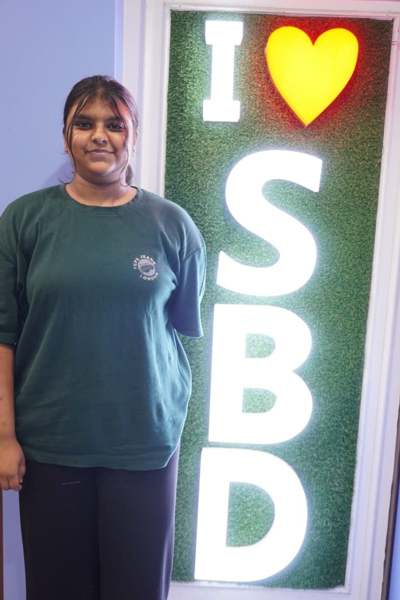 Student at the I love SBD wall