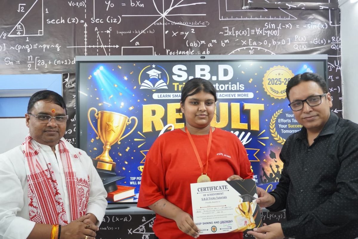 Student receiving an achievement certificate at the result ceremony