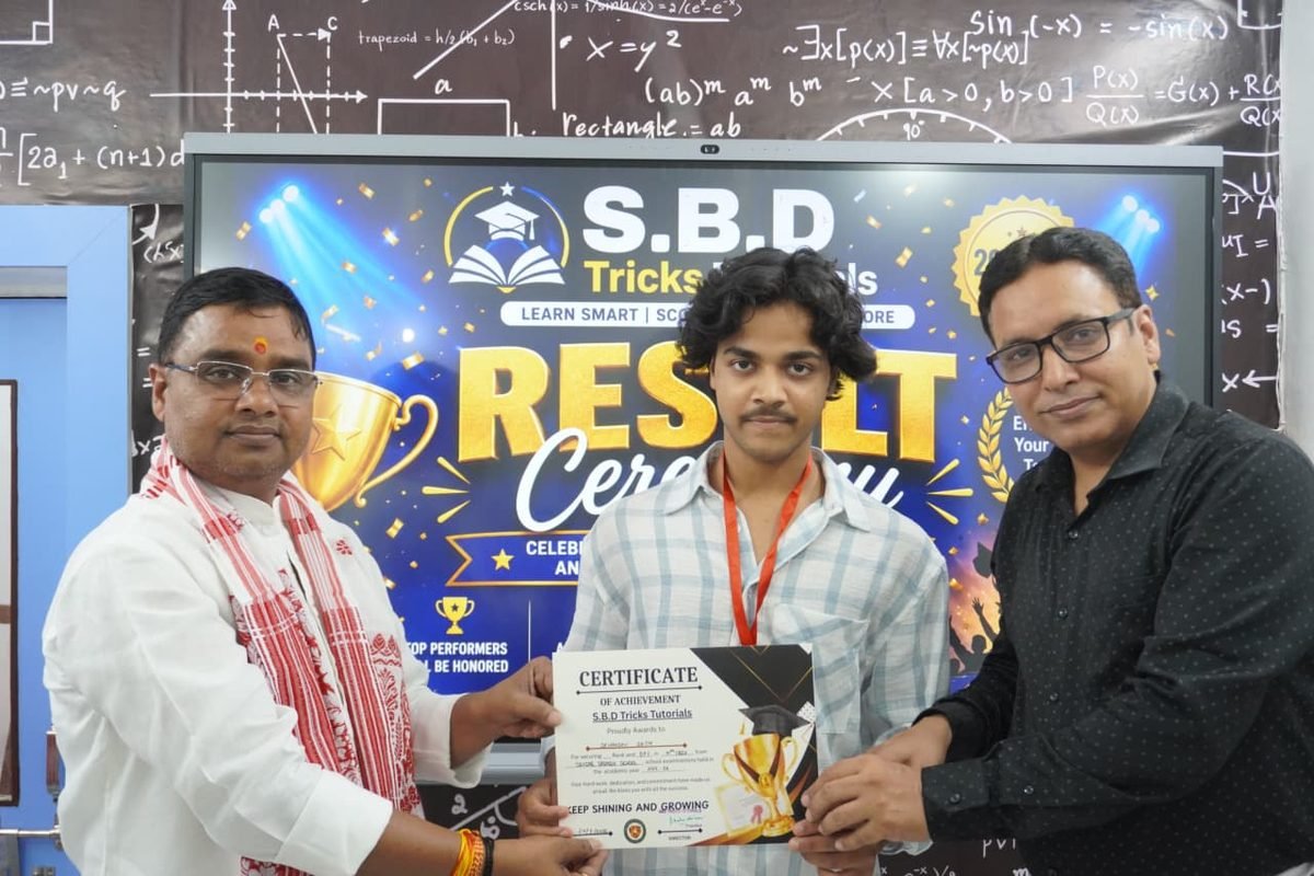 Student receiving an achievement certificate at the result ceremony