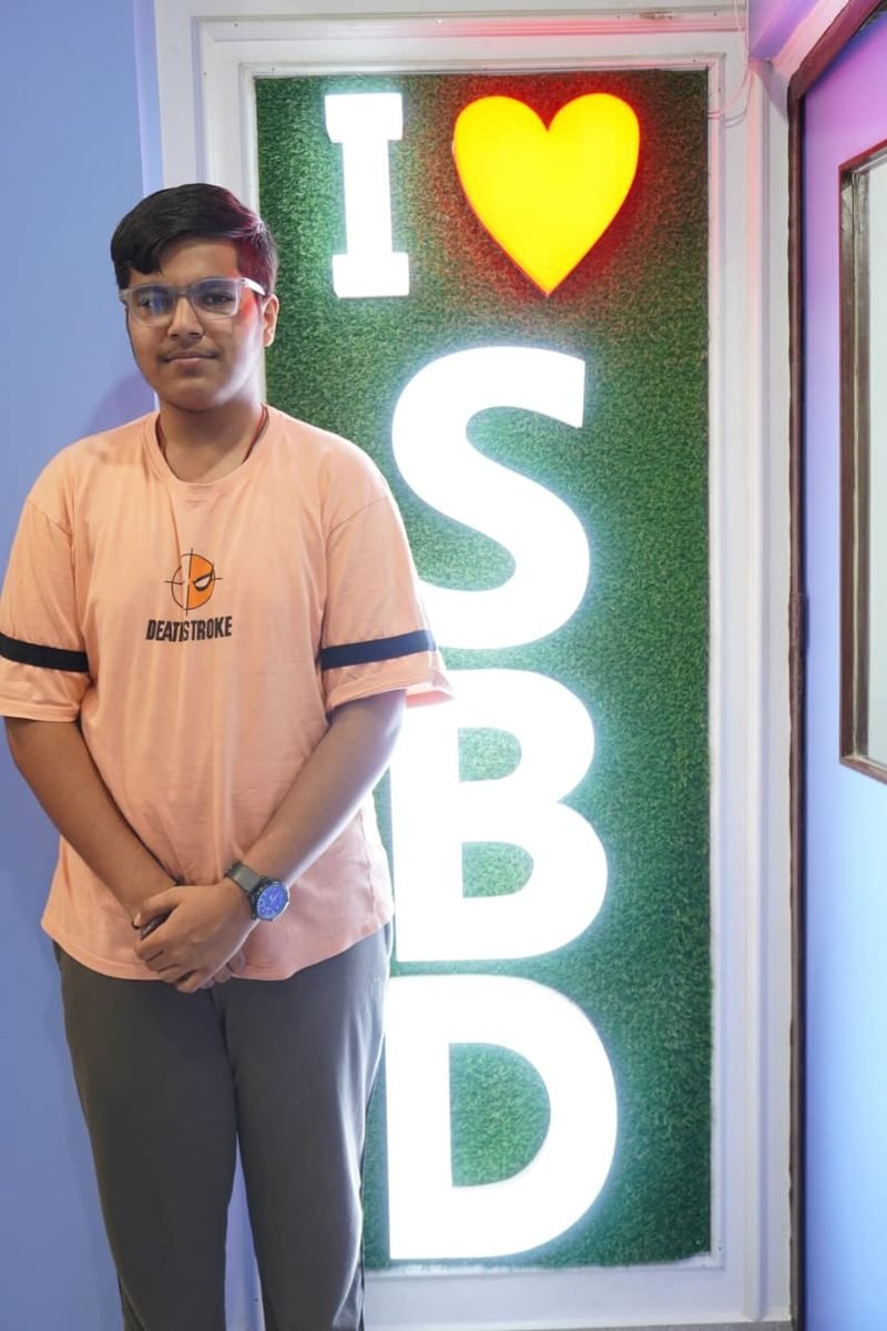 Student at the I love SBD wall