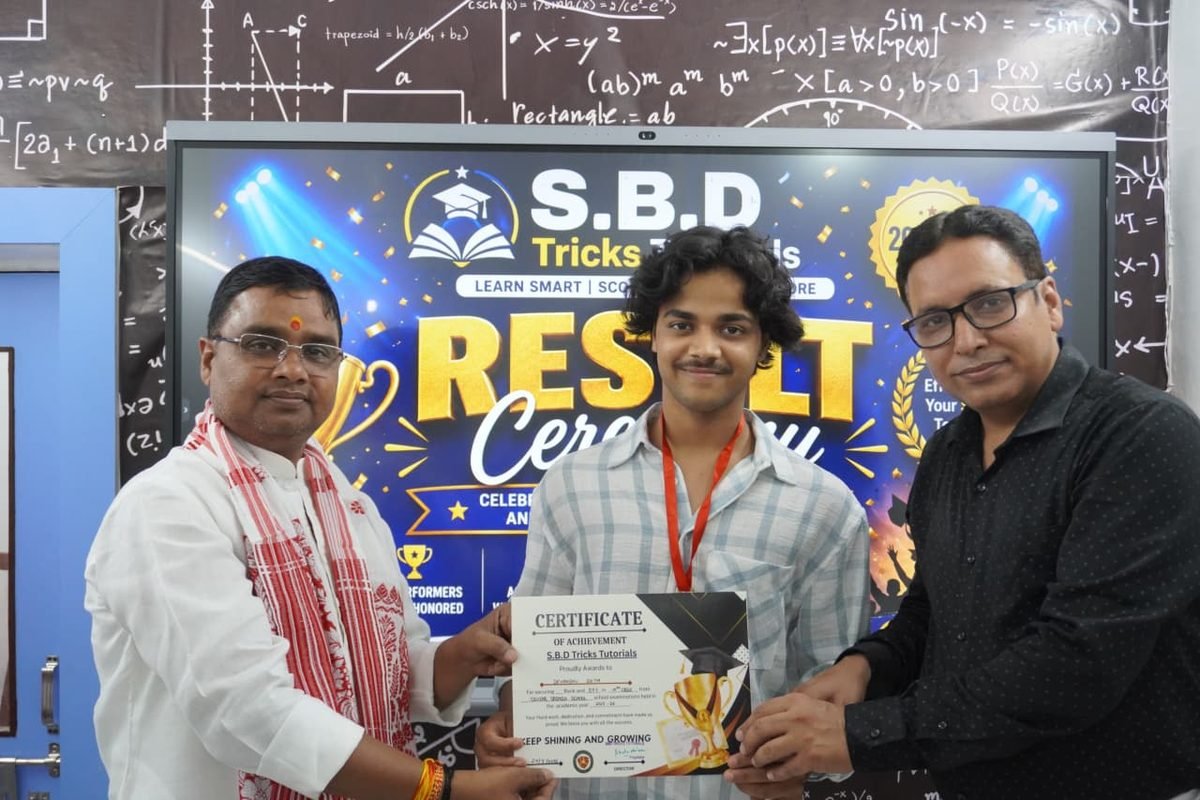 Student receiving an achievement certificate at the result ceremony