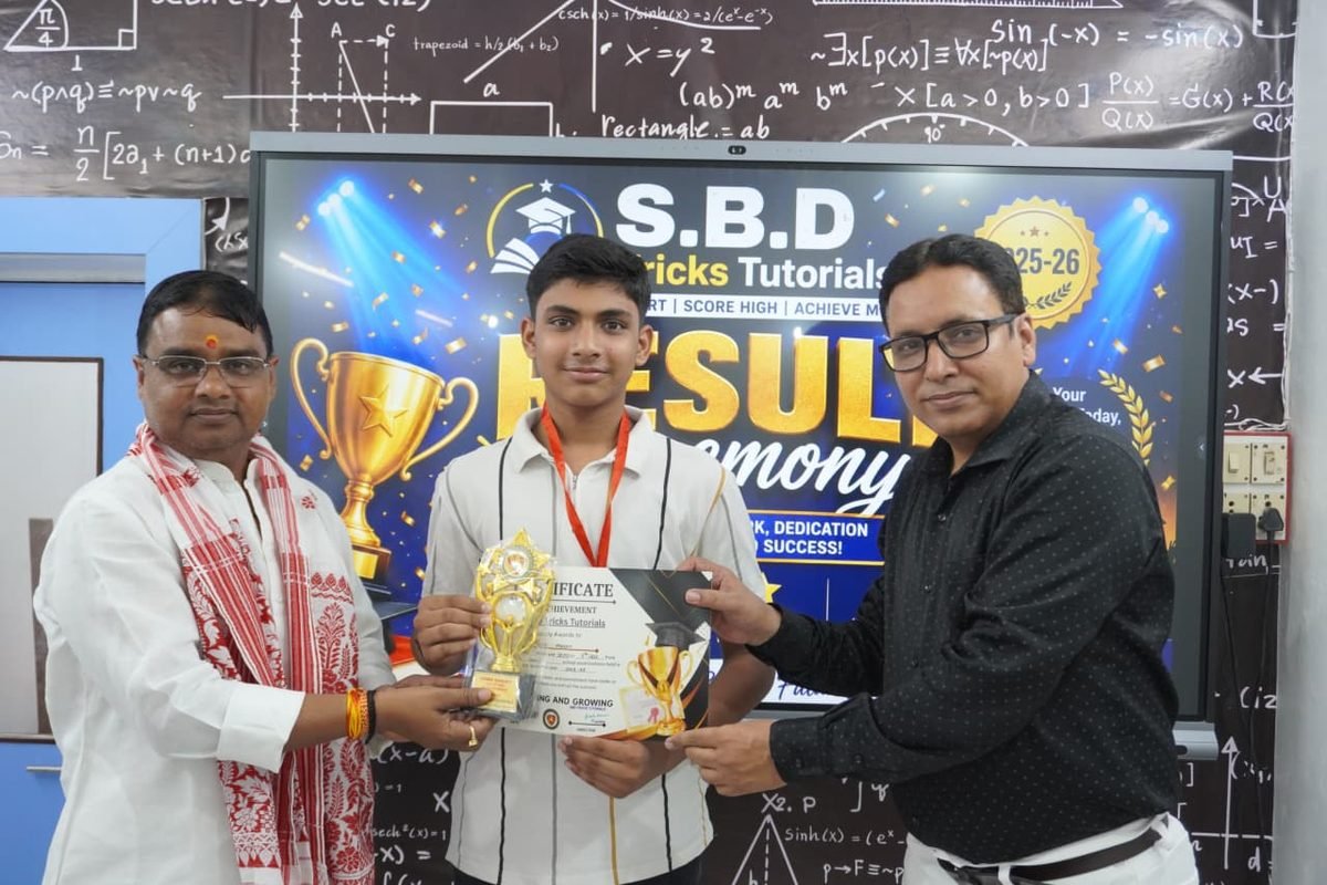 Student with a trophy and certificate at the result ceremony
